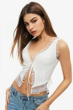 Solado Lace Trim Tie Front Sleeveless Crop Top 9 Solado Lace Trim Tie Front Sleeveless Crop Top -SOLADO Shop jpeg 44b2368d a4bf 40ea a3a1 0f74183ab14e 1800x1800