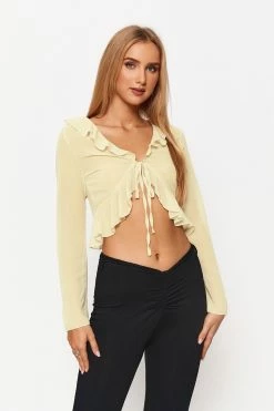 Solado Tie Front Ruffle Split Hem Long Sleeve Crop Top 8 Solado Tie Front Ruffle Split Hem Long Sleeve Crop Top -SOLADO Shop jpeg 4c40c0a0 5aea 491d be1b a91877b5c746 1800x1800