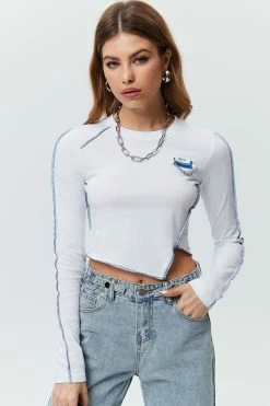Solado Irregular Hem Stitched Trim Crop Long Sleeve Blouse Top