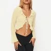 Solado Tie Front Ruffle Split Hem Long Sleeve Crop Top 2 Solado Tie Front Ruffle Split Hem Long Sleeve Crop Top -SOLADO Shop jpeg c09d06b7 e575 4850 89e2 09a1903bc679 1800x1800